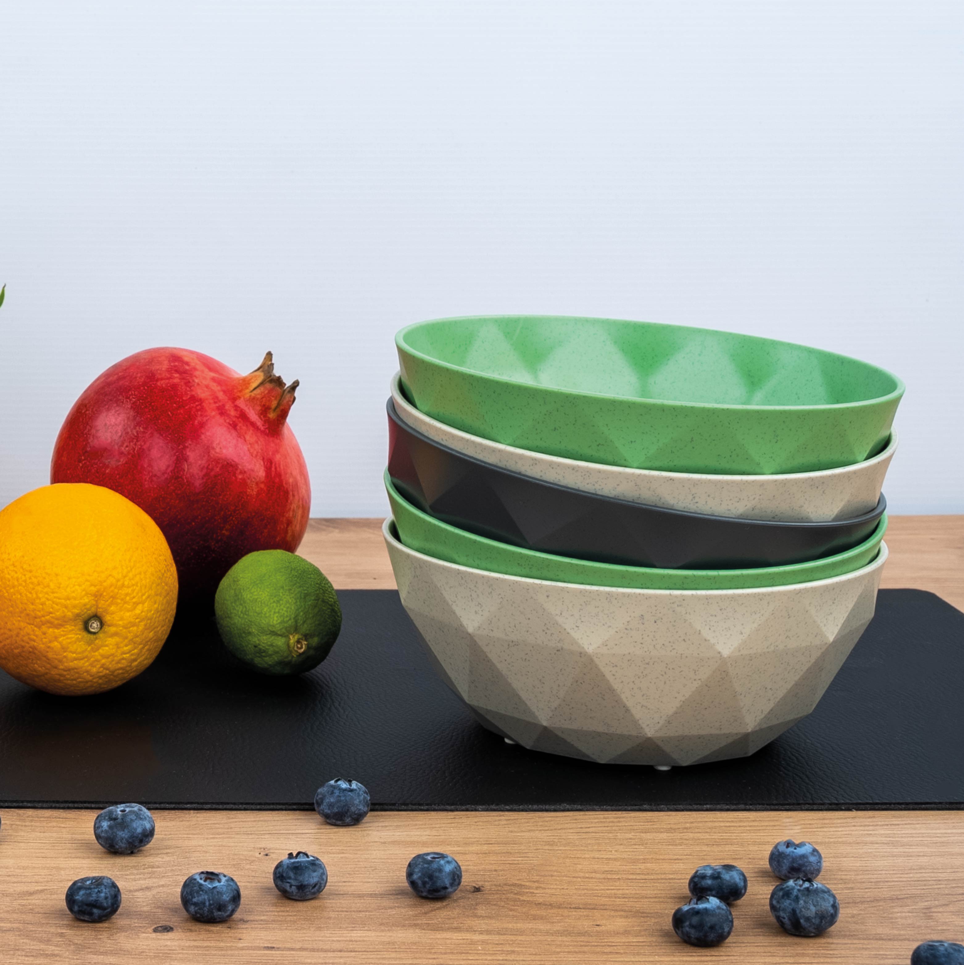 Magnetische Bowls fixieren sich gegenseitig auf der metallischen Nano-Gel-Matte